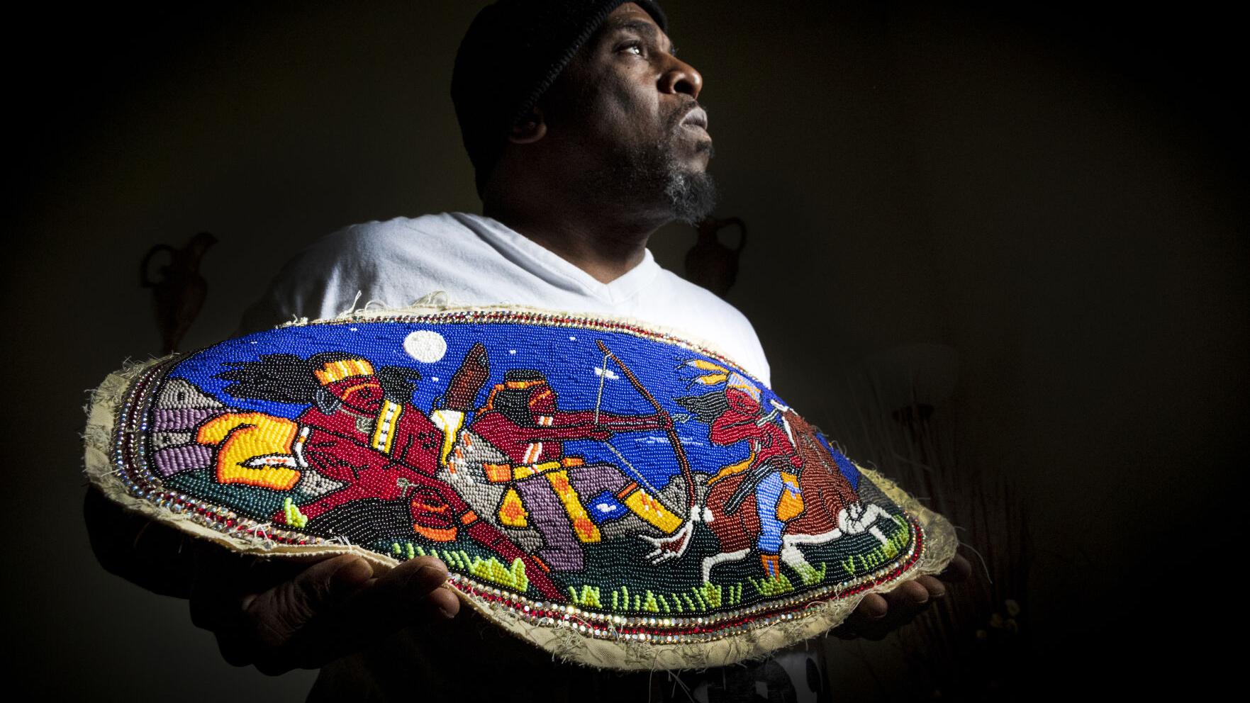 Brian Banks’ Mardi Gras Indian suits help him deal with son’s murder